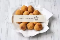 Transfer the finished croquettes with a spoon onto...