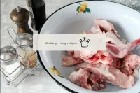 Chop the rabbit into pieces and fill with cold wat...