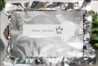 Take a second sheet of foil, cover them with potat...