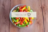 Peel the bell peppers from the seeds and stalks an...