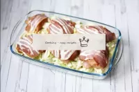 Put the cabbage in a baking dish. Spread the chunk...