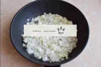 In another pan, fry the finely chopped onions for ...