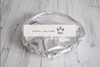 Cover the tin with foil and put in an oven heated ...