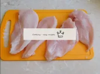 Cut the chicken fillet lengthways into portions. B...