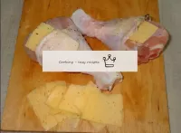 Cut the hard cheese into thin slices. Carefully de...
