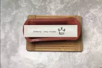 Place the roll in a narrow, long baking tin. When ...