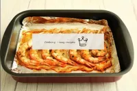 Open the tin and bake the langoustines in the oven...