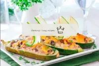 Zucchini boats in the oven with minced meat and mu...