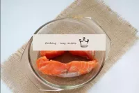 Place the salmon fillet in a baking dish. ...