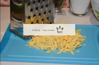 Grate the hard cheese over a coarse grater. If you...