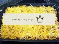 Sprinkle the dish with grated cheese. ...