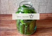 Next, put the cucumbers in a jar. ...