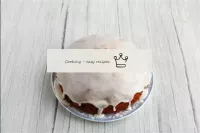 Vollständig abgekühlten Cupcake mit einer Glasur b...