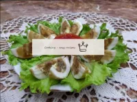 Place the eggs on the lettuce leaves. Decorate as ...