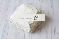 Fold the cakes on top of each other and form a hig...