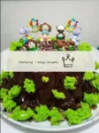 Trukhlyav stump cake with moss and mastic figures...