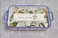 Take a suitable baking dish. Drip some vegetable o...