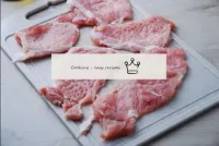Cut the pork meat into portions about 1cm thick an...