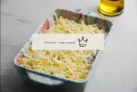 Grate hard cheese on a coarse grater. Sprinkle it ...