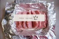 Prepare the baking dish. Cover it with foil. Put t...