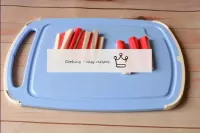 Crab sticks are cut into 4 parts by strips commens...