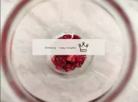 Transfer the cranberries to a high decanter, in wh...