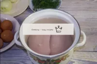 Boil chicken fillet in salted water (from boiling ...