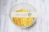 Put the cornflakes in a bowl. If the flakes are la...