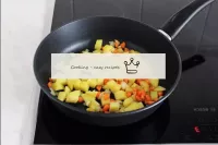 Add the potatoes to the pan to the vegetables, mix...