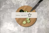 Cut the cucumber into rings. If the cucumber has a...
