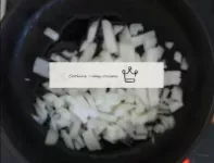 Cut the onions and fry over a low heat in a frying...