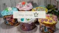 Easter cakes with chicken and candied fruit on yea...