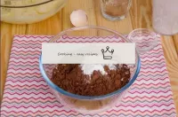In a separate container, combine flour, cocoa powd...