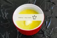 Transfer the butter to a deep container, melt in a...