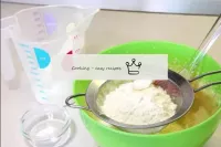 Mix the baking powder with flour and sieve into a ...