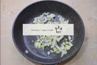 To make the filling, peel the onion, rinse it in c...