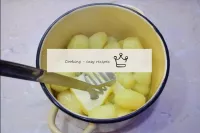 Cover the peeled potatoes with water, bring to a b...