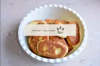 Fold the finished pies into a bowl and cover with ...