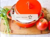 Cover the pan with a lid and leave the tomatoes to...