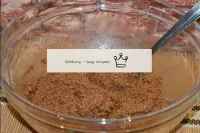 Add a little coffee to the dry mixture and mix the...