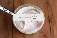 Gently stir the whipped cream into the curd and be...