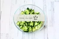 Wash and dry the cucumber. Cut into small cubes. T...