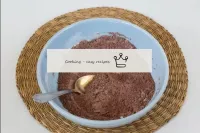 In a separate container, combine and mix cocoa pow...
