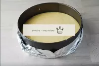 Line the cake tin (18cm diameter) with baking pape...