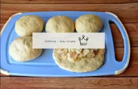 Roll each dough ball with a rolling pin into a cak...