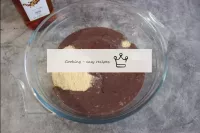 The resulting cream-condensed mixture with cocoa i...