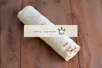 Roll the pita bread with a thick roll. How to roll...