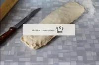 Roll the dough with a roll, pinch the edge tightly...