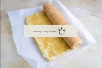 Twist the roll so that the apple filling is inside...