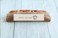 Use cling film to roll up the dense roll. ...